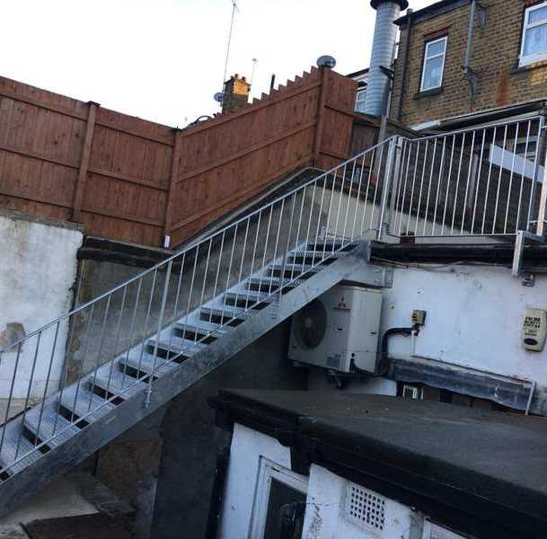 External fire escape stair with balustrade