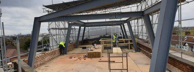 Rooftop steel frame going up
